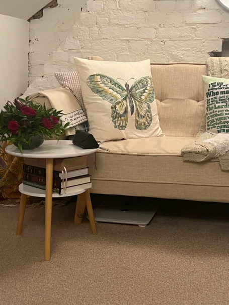 A calm space with natural light and minimal decor, symbolizing mental clarity and the restorative power of decluttering.